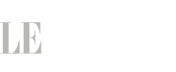 Logo Le Devoir blanc